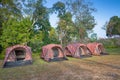 Camping tent on green grass field Royalty Free Stock Photo