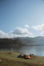 The camping tent near a mountain lake