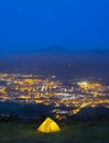 Camping tent at night with the lights of the city in the background, Irun in Euskadi Royalty Free Stock Photo