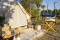 Camping tent and picnic table in the mountains. Royalty Free Stock Photo