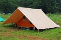 Camping tent in a scout camp on the lawn Royalty Free Stock Photo