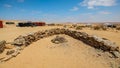 Camping tents and campfire in the middle of the Moroccan Sahara