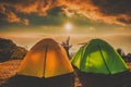 Camping and tents On high ground with sunrise sunset Royalty Free Stock Photo