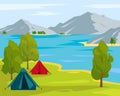 Camping tents near the lake and mountains. Royalty Free Stock Photo