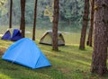 Camping tents near lake Royalty Free Stock Photo