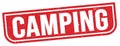 CAMPING text written on red stamp sign