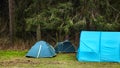 Camping. Tourist tents in the forest