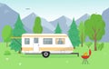 Camping trailer and barbecue near mountains