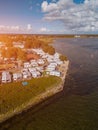 camping with trailers and campers at sea shore with beach, campsite aerial view