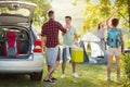 Camping trip, Young happy people say hello arrived friends Royalty Free Stock Photo