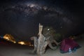 Camping under starry sky and Milky Way arc, with details of its colorful core, outstandingly bright, captured in Southern Africa. Royalty Free Stock Photo