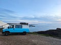 Camping van ocean cliff Portugal Royalty Free Stock Photo