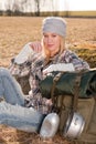 Camping young woman in countryside backpack relax