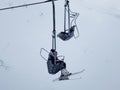 Campitello Matese - Skiers suspended by chairlift Royalty Free Stock Photo