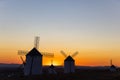 Campo de Criptana windmills creating a stunning sunset silhouette Royalty Free Stock Photo