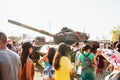 People visiting and taking photos of a war tank Royalty Free Stock Photo