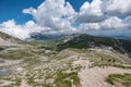 People climbing the trail to Duca degli Abruzzi Lodge, Italy