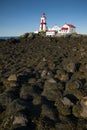 Slippery Rocks Lead to Canadian Lighthouse