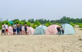 Campsite on beach. Tents on sea beach with sky and green background. Tent on the beach, Bay area day trip activities.