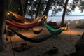 campsite with beach views, hammocks, and lanterns