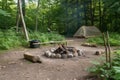 campsite with bonfire and marshmallow roasting stick waiting to be used