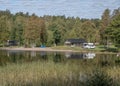 campsite camping caravan by lake Ragnerudssjoen in Dalsland Sweden beautiful nature forest pinetree Royalty Free Stock Photo