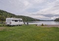 campsite camping caravan by lake Ragnerudssjoen in Dalsland Sweden beautiful nature forest pinetree Royalty Free Stock Photo