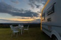 Campsite with caravans at dusk time