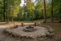 campsite with fire pit and chairs for gathering around