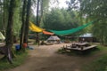campsite with hammocks, lanterns and games for fun evenings