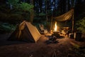 campsite with tent, lantern, and campfire for a warm and cozy stay