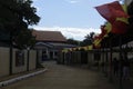 Campus in the entrance area stand on Area Flag with a Building School room partition