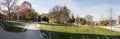 Patches of snow cover the grass on the campus of Syracuse University in Central New York. Royalty Free Stock Photo