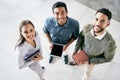 We can achieve anything as a team. Shot of a diverse group of businesspeople standing together in the office during the Royalty Free Stock Photo