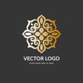 Luxury golden vector logo in the shape of a flower