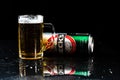 Can of Beck`s or Becks beer and beer glass on dark background. Illustrative editorial photo shot in Bucharest, Romania, 2021