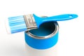 Can with blue paint with brush  isolated on white background Royalty Free Stock Photo