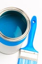 Can with blue paint with brush  isolated on white background Royalty Free Stock Photo