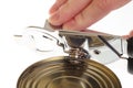 Can with can opener hand Royalty Free Stock Photo