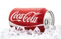 Can of Coca-Cola on a bed of ice over a white background Royalty Free Stock Photo