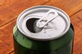 Can with drink view from the top. Green open soda aluminum can. Shiny metalic beer container close up Royalty Free Stock Photo