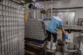 Can factory, Cannery factory plant worker loading tin can food container in convey, can food factory Royalty Free Stock Photo