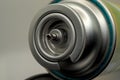 Can of gas butane on a grey closeup Royalty Free Stock Photo