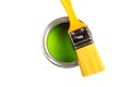 Can with green paint and brush isolated on white background top view Royalty Free Stock Photo