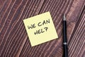 We can help text on adhesive note Royalty Free Stock Photo