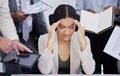 Can I have a moment alone, please. a young businesswoman looking stressed out in a demanding office environment.