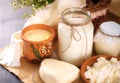 A can of milk and other dairy products on the table. Still life in rural style. Royalty Free Stock Photo