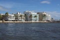 Seagulls in bay and BQ Aquamarina oceanfront hotel in strong winds