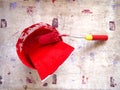 Can and roller brush with red paint Royalty Free Stock Photo