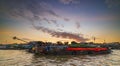 Can Tho, Vietnam - january 7, 2020: Cai Rang floating market at sunrise, boats selling wholesale fruits and goods on Can Tho River